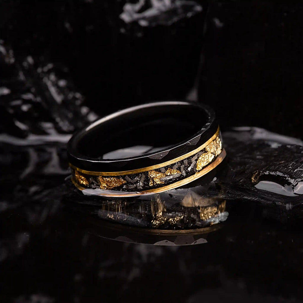 Elegant Orion Ring of Black Meteorite with Luxurious Gold Leaf Details