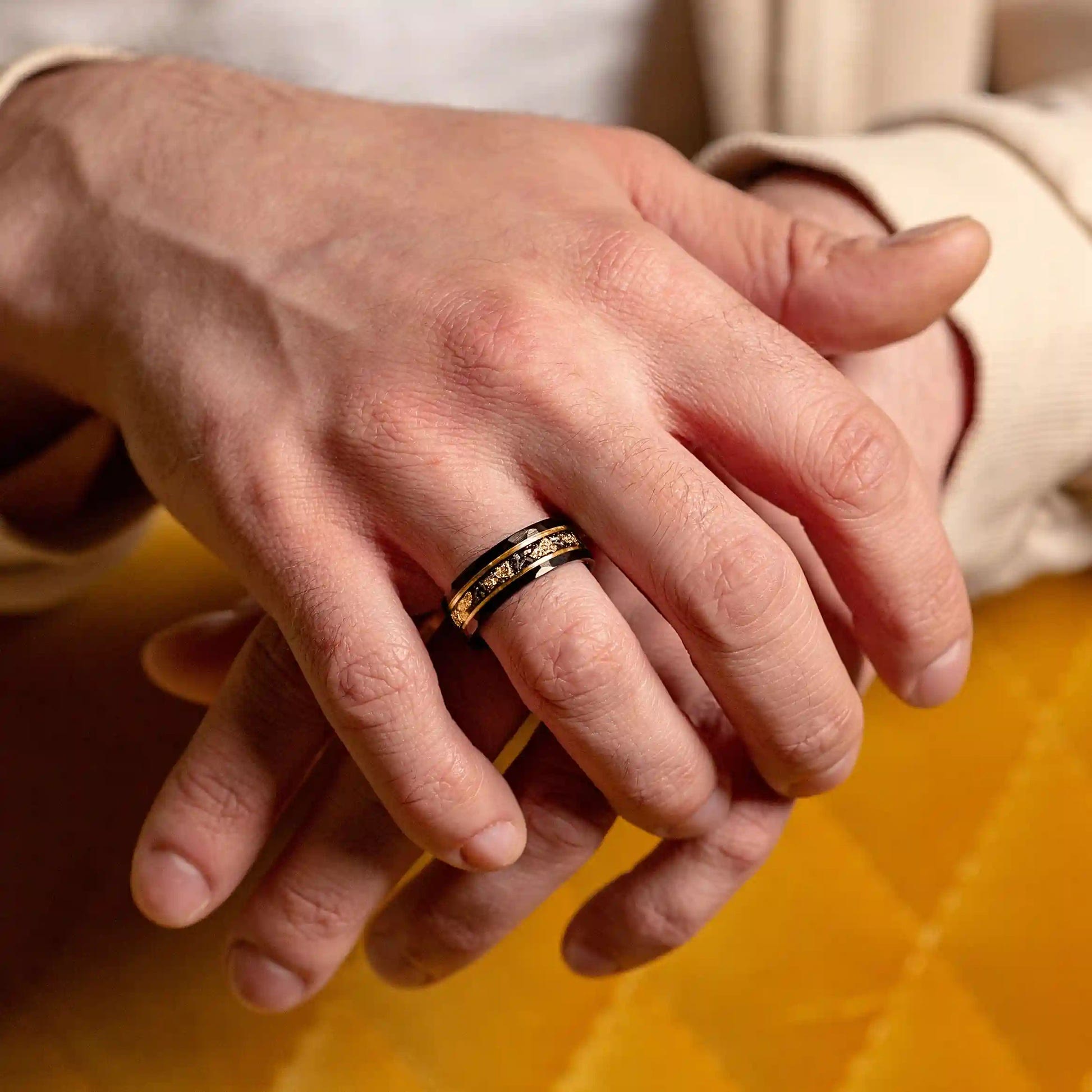 Elegant Orion Ring of Black Meteorite with Luxurious Gold Leaf Details