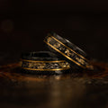 Elegant Orion Ring of Black Meteorite with Luxurious Gold Leaf Details