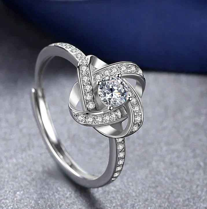 Spoil your loved one with our Enchanting Love Knot Ring - the Perfect Gift!