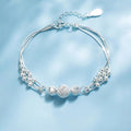 Elegant Silver Bracelet with Multiple Luminous Pearls