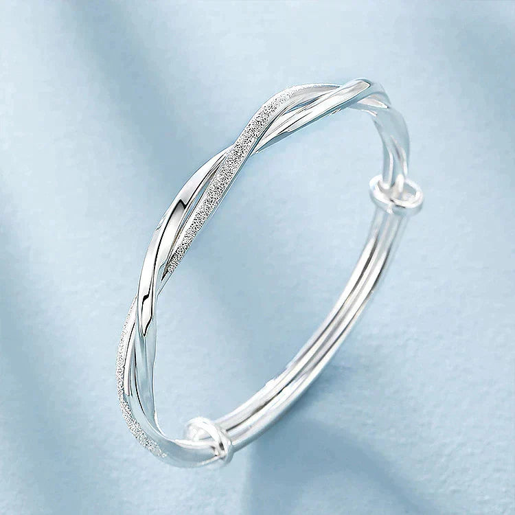 Elegant Twisted Silver Bangle