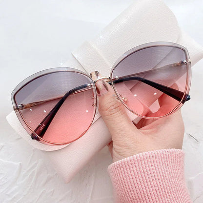 AnnaShade - Stylish Oval Rimless Sunglasses