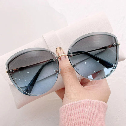 AnnaShade - Stylish Oval Rimless Sunglasses