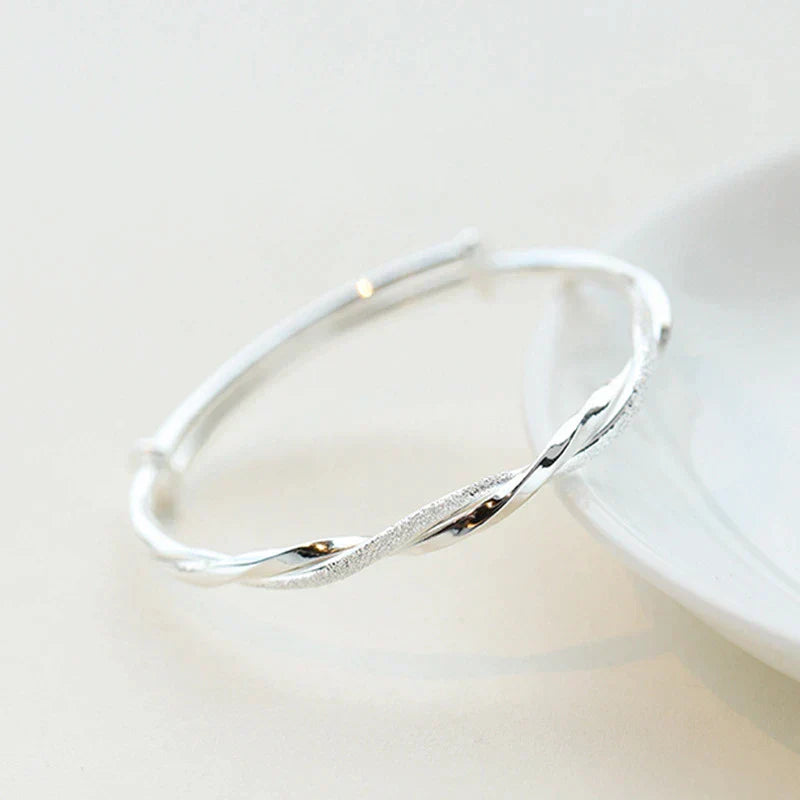 Elegant Twisted Silver Bangle