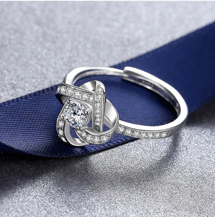 Spoil your loved one with our Enchanting Love Knot Ring - the Perfect Gift!