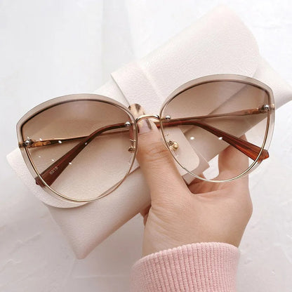 AnnaShade - Stylish Oval Rimless Sunglasses