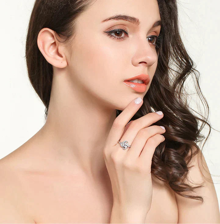 Spoil your loved one with our Enchanting Love Knot Ring - the Perfect Gift!