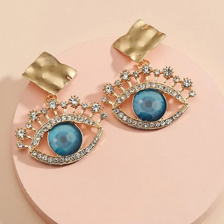 Alluring Golden Vintage Earrings with Protective Evil Eye - Nerina