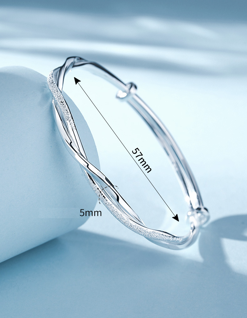 Elegant Twisted Silver Bangle