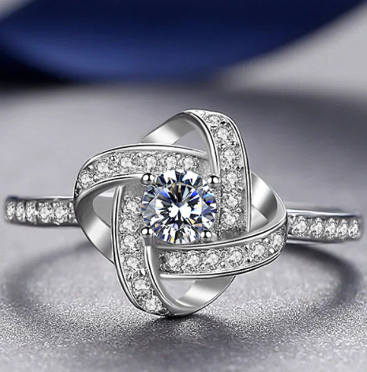 Spoil your loved one with our Enchanting Love Knot Ring - the Perfect Gift!