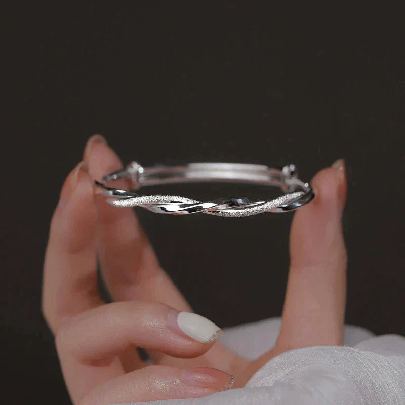 Elegant Twisted Silver Bangle