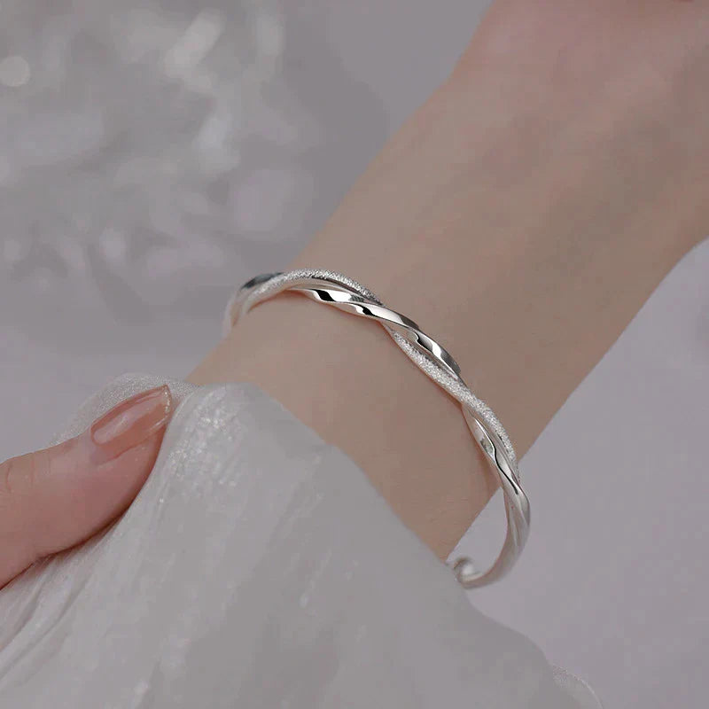 Elegant Twisted Silver Bangle