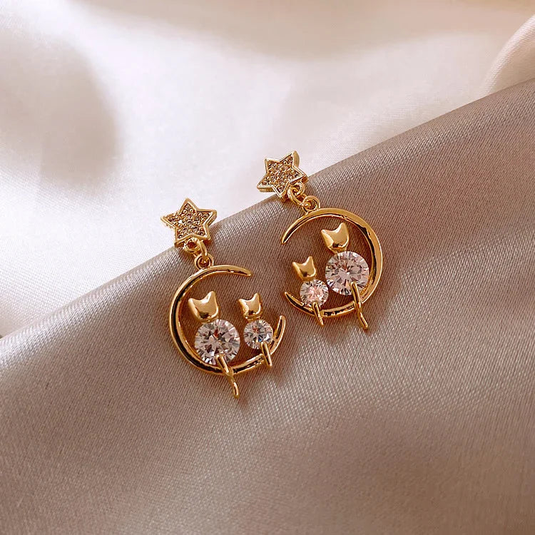 Elegant Gold Cat Ear Earrings with Sparkling Zirconia - Feline Glamour