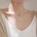 Elegant Silver Necklace with a Climbing Cat - Felina