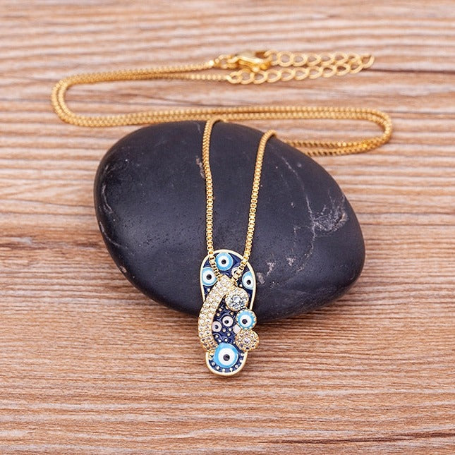 Alluring Gold Chain with Flip Flop Pendant and Protective Evil Eye - Selma