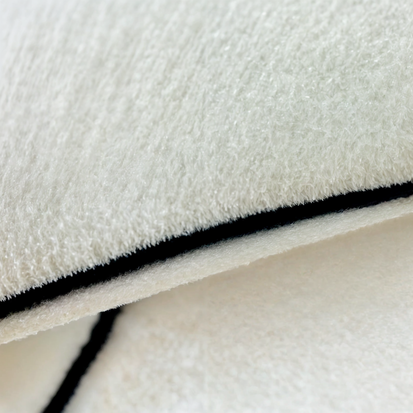 Woolly Waves – Minimalist Round Wool Rug with Unique Shape