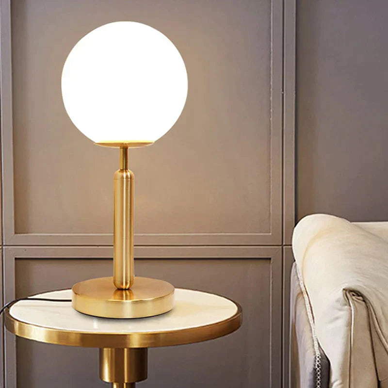 Stylish Brass & Glass LED Table Lamp – GlowSphere