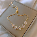 Elegant Gold Floral Bracelet with Sparkling Crystals - Rosalind