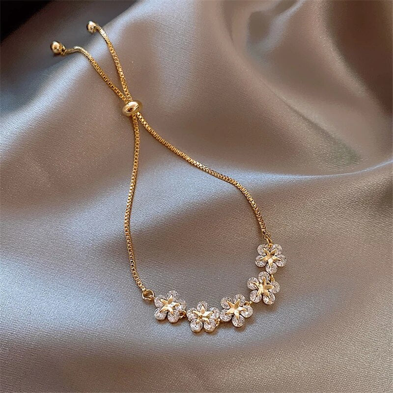 Elegant Gold Floral Bracelet with Sparkling Crystals - Rosalind