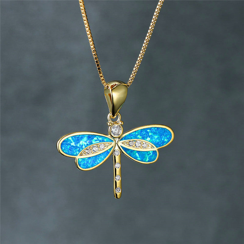 Enchanting Gold Dragonfly Necklace with Radiant Opal - Isolde Series