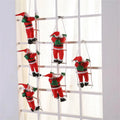 Climbing Santa Claus - Christmas Decoration for the Holidays